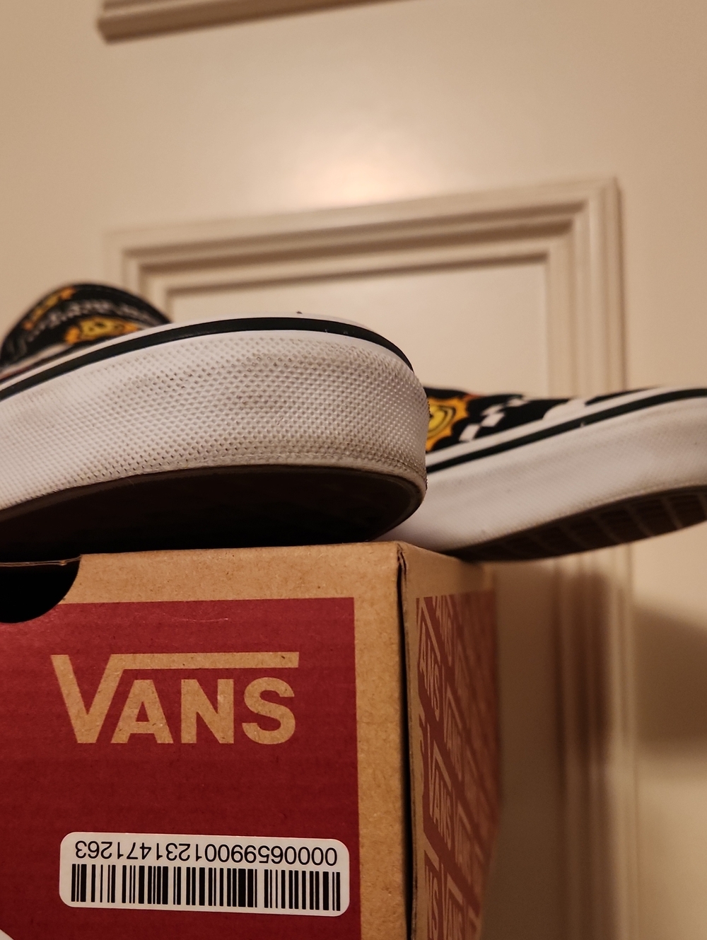 Vans Black Slip-On Sneakers with Yellow & Blue Smiley Pattern - Picture 5 of 5